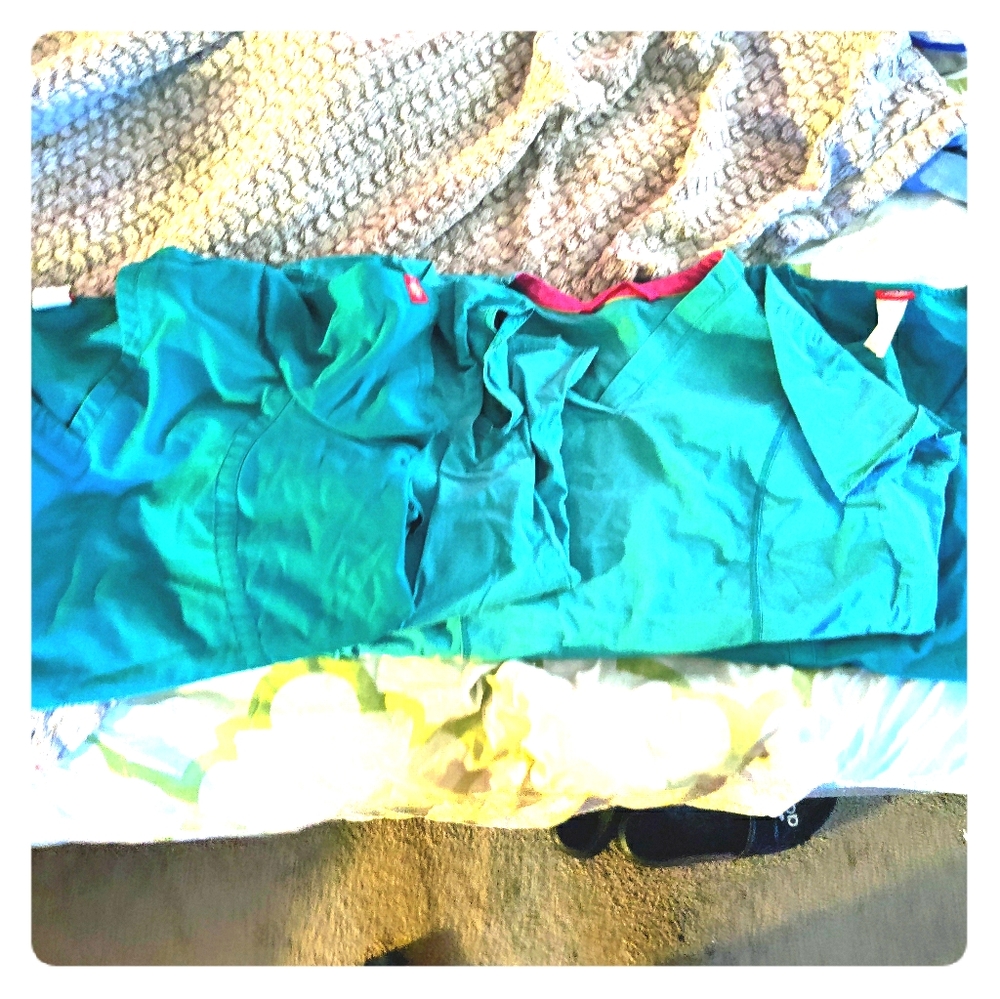 6 turquoise tops and 1 bottom